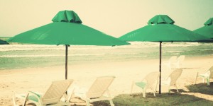 Green Umbrellas at the Beach